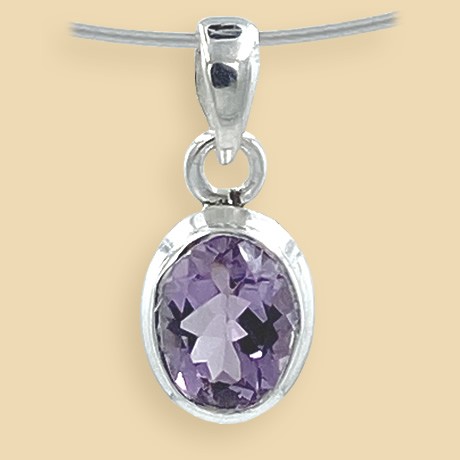 Amethyst pendant faceted in silver setting (925)